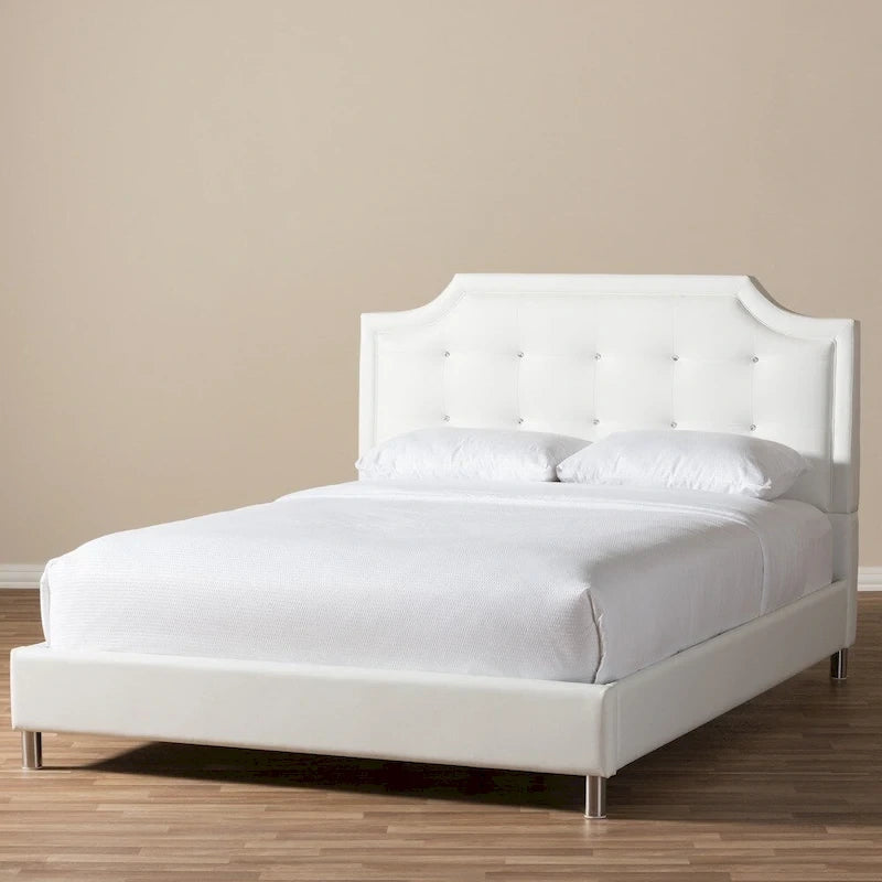 Letto a piattaforma con testiera imbottita