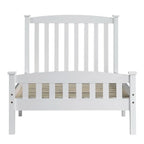 Letto a piattaforma in legno con testiera