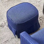Poltrona girevole a barilotto con pouf