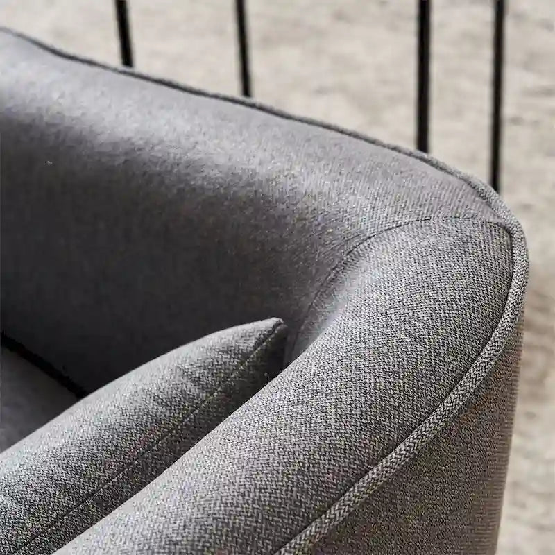 Poltrona girevole a barilotto con pouf