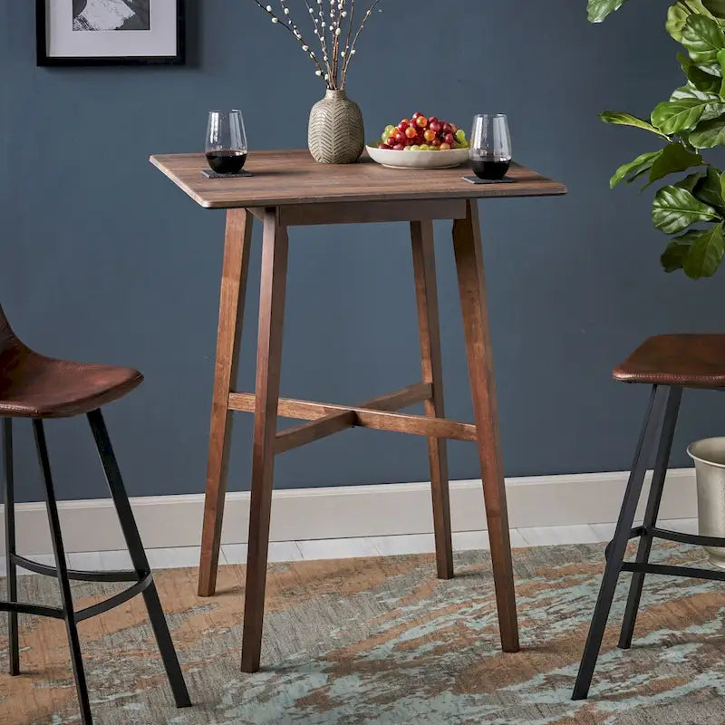 Tavolo da pranzo alto con gambe in legno di hevea e piano laminato